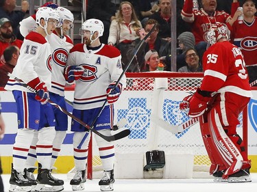 Montreal Canadiens right wing Joel Armia, second from left, celebrates his goal against the Detroit Red Wings in the second period of an NHL hockey game, Tuesday, Feb. 26, 2019, in Detroit.