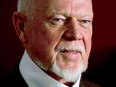 Hockey commentator Don Cherry speaks to reporters at the Hockey Hall of Fame on Tuesday, Feb. 15, 2011, in Toronto.