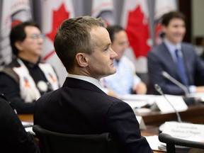 Minister of Indigenous Services Seamus O'Regan takes part in a meeting with Assembly of First Nations leaders in Ottawa on January 14, 2019. The federal government is working "day and night" to ensure concerns over proposed child welfare legislation are taken seriously to enable the bill to be introduced soon, Indigenous Services Minister Seamus O'Regan said Friday. It would be unhelpful and "entirely disrespectful" if the concerns were not heard, O'Regan said in an interview, adding the government hopes to be able to move ahead in tabling the bill as quickly as possible.