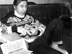 Kenneth Deer, owner, editor-in-chief and main contributor of the Eastern Door, with the newspaper's first edition, at home in Kahnawake on Feb. 4, 1992.