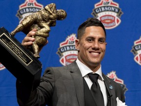 Toronto Argonauts receiver Chad Owens poses with the trophy for Most Outstanding Player during the CFL awards show in Toronto Thursday, November 22, 2012.