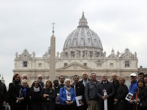 Members of the ECA (Ending of Clergy Abuse) organization and survivors of clergy sex abuse pose for photographers outside St. Peter's Square, at he Vatican, Monday, Feb. 18, 2019. Organizers of Pope Francis' summit on preventing clergy sex abuse will meet this week with a dozen survivor-activists who have come to Rome to protest the Catholic Church's response to date and demand an end to decades of cover-up by church leaders.