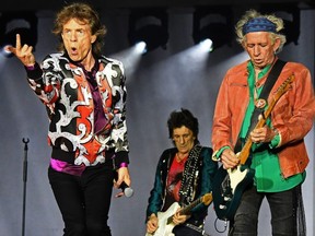 British musicians Mick Jagger, Ronnie Wood and Keith Richards of The Rolling Stones perform during a concert at The Velodrome Stadium in Marseille on June 26, 2018, as part of their No Filter tour.