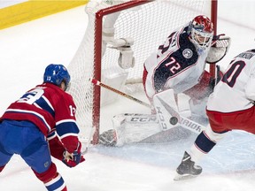 Montreal Canadiens centre Max Domi scores past Columbus Blue Jackets goaltender Sergei Bobrovsky during first period in Montreal on Feb. 19, 2019.