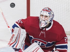 Canadiens goalie Antti Niemi makes save against the New Jersey Devils during third period on NHL game at the Bell Centre in Montreal on Saturday, February 2, 2019.