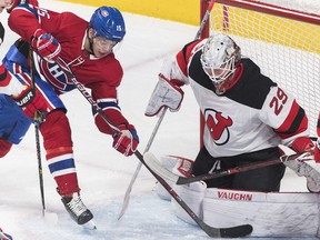 Montreal Canadiens' Jesperi Kotkaniemi moves in on New Jersey Devils goaltender Mackenzie Blackwood during second period in Montreal on Feb. 2, 2019.