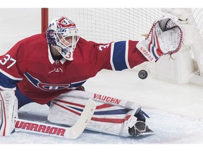 Canadiens goaltender Antti Niemi is scored on by New Jersey Devils' Will Butcher in Montreal on Saturday, Feb. 2, 2019.