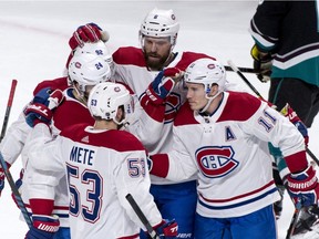 Canadiens' Brendan Gallagher (11) celebrates his second goal with teammates during first period Tuesday night at the Bell Centre.