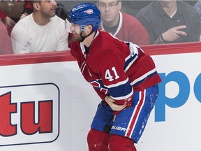 Montreal Canadiens' Paul Byron skates off the ice after being injured by Edmonton Oilers' Matt Benning during second period in Montreal on Feb. 3, 2019.