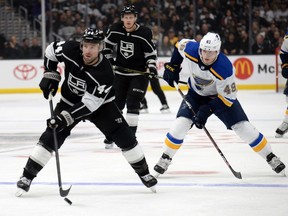 Former Kings centre Nate Thompson skates ahead of Blues' Ivan Barbashev (49) during a game in January. Thompson was happy to waive his no-trade clause so the Canadiens could acquire him.