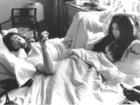 John Lennon and Yoko Ono, durng their l969 love-in at the Queen Elizabeth Hotel. They wrote Give Peace a Chance in suite 1742 during their stay.