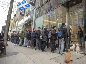 Lineups resume as the government cannabis outlets re-open Thursday, November 1, 2018 in Montreal. The government outlets have been forced to cut their hours to Thursday through Sunday due to supply shortages.THE CANADIAN PRESS/Ryan Remiorz ORG XMIT: RYR102