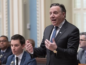 Quebec Premier Francois Legault responds to the Opposition, during question period Wednesday, February 6, 2019 at the legislature in Quebec City.