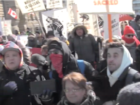 Screen shot from Canadian Press video about pro-pipeline protest on Parliament Hill in Ottawa.