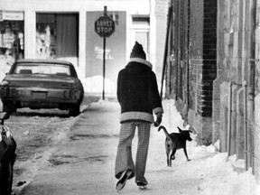 A child skates down a sidewalk in Point St. Charles on Feb. 3, 1975. Photo by Len Sidaway, Montreal Gazette
