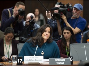 Cameras surround Jody Wilson-Raybould before her appearance in front of the Justice committee in Ottawa, Wednesday February 27, 2019.
