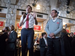 Prime Minister Justin Trudeau, left, campaigns with Richard T. Lee, the Liberal candidate in the Burnaby South byelection, in Burnaby, B.C., on Sunday February 10, 2019. Federal byelections will be held on Feb. 25 in three vacant ridings - Burnaby South, where NDP Leader Jagmeet Singh is hoping to win a seat in the House of Commons, the Ontario riding of York-Simcoe and Montreal's Outremont.