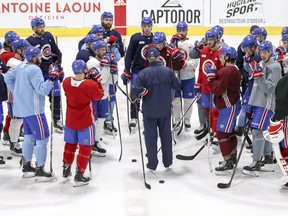 Canadiens coach Claude Julien speaks to his players during practice at the Bell Sports Complex in Brossard on Jan. 31, 2019.