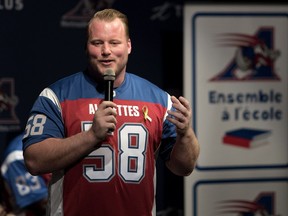 Alouettes lineman Luc Brodeur-Jourdain speaks to students at Antoine-de-Saint-Exupery School in Montreal on Feb. 15, 2018.