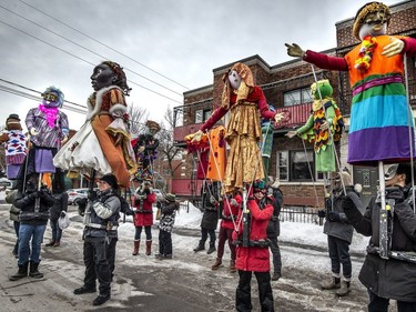 Members of the Italian community carrying marionettes take their positions as they prepare to parade through Little Italy in Montreal, on Saturday, March 2, 2019.
