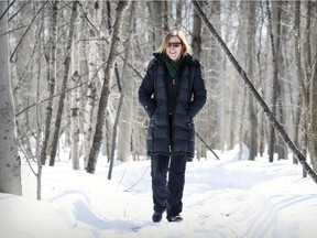 Brenda O'Farrell walks in the woods near her home in St-Lazare.