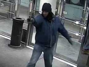 The suspect in the Peel St. robbery was wearing a black tuque, blue coat and beige boots.