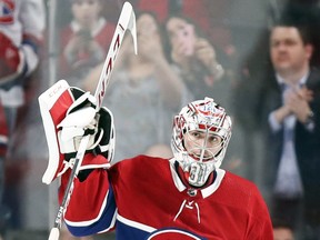 Canadiens goalie Carey Price acknowledges applause from Bell Centre fans after breaking Jacques Plante's franchise record for most wins by a goalie with 315 following 3-1 victory over the Detroit Red Wings in Montreal on March 12, 2019.