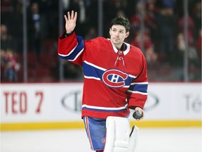 Montreal Canadiens' Carey Price acknowledges applause after breaking Jacques Plante's record for most wins by a Habs goalie following victory over the Detroit Red Wings in Montreal Tuesday March 12, 2019.