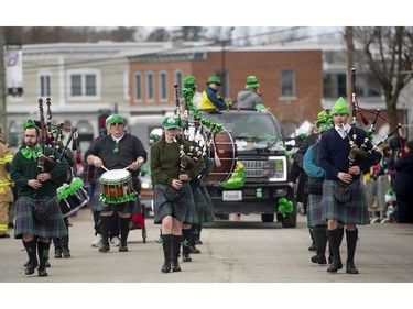 A marching band makes its way along Main Street in Hudson during the 10th Annual Hudson St. Patrick's Parade.