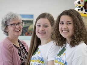 Sisters Isabel and Jane Szollosy, right, with Karen Henchey, former director of West Island Women's Centre, spoke at the WIWC's 20th annual International Women's Day brunch last week.