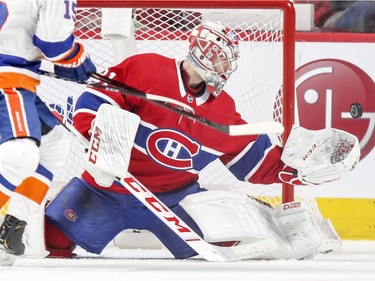 Canadiens' Carey Price makes a glove save during third period at the Bell centre Thursday night.