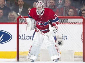 Montreal Canadiens Carey Price keeps an eye on the action during second period against the New York Islanders in Montreal on March 21, 2019.
