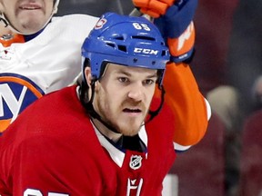 Canadiens Andrew Shaw battles New York Islanders in front of the Islanders goal during second period of National Hockey League game in Montreal Thursday March 21, 2019.