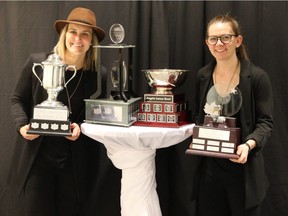 Les Canadiennes' Marie-Philip Poulin, left, and Erin Ambrose with their trophies from the Canadian Women's Hockey League awards on Friday, March 22, 2019. Poulin won (from left) the Jayna Hefford trophy for players' MVP, the CWHL MVP Award, and the Angela James Bowl for most points in the league. Ambrose won the CWHL Defenceman of the Year trophy.