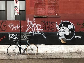 a bicycle in the snow on a montreal street
