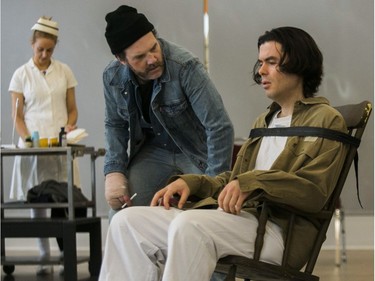McMurphy, played by David Anderson speaks with Nick Fontaine, playing Chief in a rehearsal by The Hudson Players Club adaptation of One Flew Over the Cuckoo's Nest. The play will run from April 4-14.