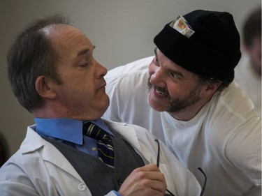 McMurphy, played by David Anderson gets in the face of of Dr. Spivey, played by Simon Côté in a rehearsal by The Hudson Players Club adaptation of One Flew Over the Cuckoo's Nest. The play will run from April 4-14. On the left is character Dale Harding playing Joe Dineen.