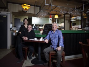 Playwright Vittorio Rossi, centre, at Pizza Nino with co-owners Frank Pino and his niece Cynthia Pino. "Traditional neighbourhoods like Ville-Émard need family-run places like this," Rossi says.