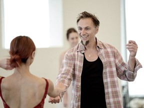 Les Grands Ballets artistic director Ivan Cavallari rehearses Giselle with Yui Suagawara.