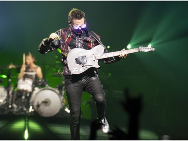 English rock trio Muse  performs at the Bell Centre in Montreal on Saturday, March 30, 2019.