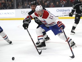 Canadiens' Brendan Gallagher fends of Kings' Alec Martinez Tuesday night in Los ANgeles. OF Gallagher's 30 goals this season, 26 have been scored at even strength.