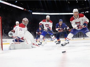 Canadiens goaltender Carey Price keeps his eyes on the puck during the game against the New York Islanders at Nassau Coliseum on Thursday,  March 14, 2019, in Uniondale, N.Y.