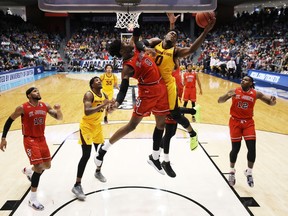 DAYTON, OHIO - MARCH 20: Luguentz Dort #0 of the Arizona State Sun Devils drives to the basket against Sedee Keita #0 of the St. John's Red Storm during the first half in the First Four of the 2019 NCAA Men's Basketball Tournament at UD Arena on March 20, 2019 in Dayton, Ohio.