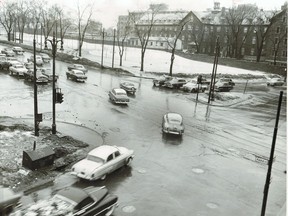 In a photo from our archives dates March 12, 1955, traffic moves through the Park and Pine intersection.
