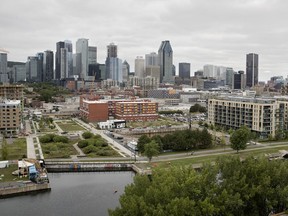 The Montreal skyline as seen from Griffintown, south of the Lachine Canal, in Montreal on Thursday August 30, 2018. The greening of the Lachine Canal has had profound consequences, Steven High says.