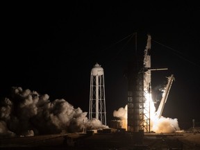 The SpaceX Falcon 9 rocket with the company's Crew Dragon spacecraft onboard takes off during the Demo-1 mission, at the Kennedy Space Center in Florida on March 2, 2019.