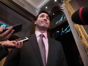 Canadian Prime Minister Justin Trudeau speaks to the media before question period in Ottawa on Feb. 27, 2019.