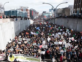 Tens of thousands of young Montrealers flooded city streets on Friday to demand urgent action on climate change.