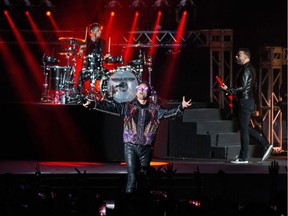 Dominic Howard, left, Matt Bellamy and Chris Wolstenholme of Muse perform during the IndyCar Classic at Circuit of the Americas on March 23, 2019 in Austin, Tex. They will be performing at the Bell Centre on Saturday night.