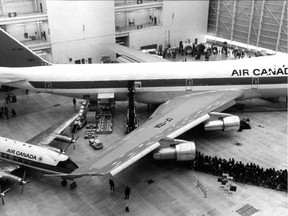 In this cropped version of a photo published in the Montreal Gazette March 22, 1971, crowds line up to see the airline's new Boeing 747 at an Air Canada open house the previous weekend. The smaller plane next to it is a Viscount. The full photo appears in the text of the article.